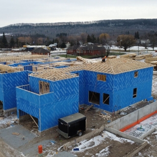 How Are Roof Trusses And Prefab Wall Panels Related To Each Other?